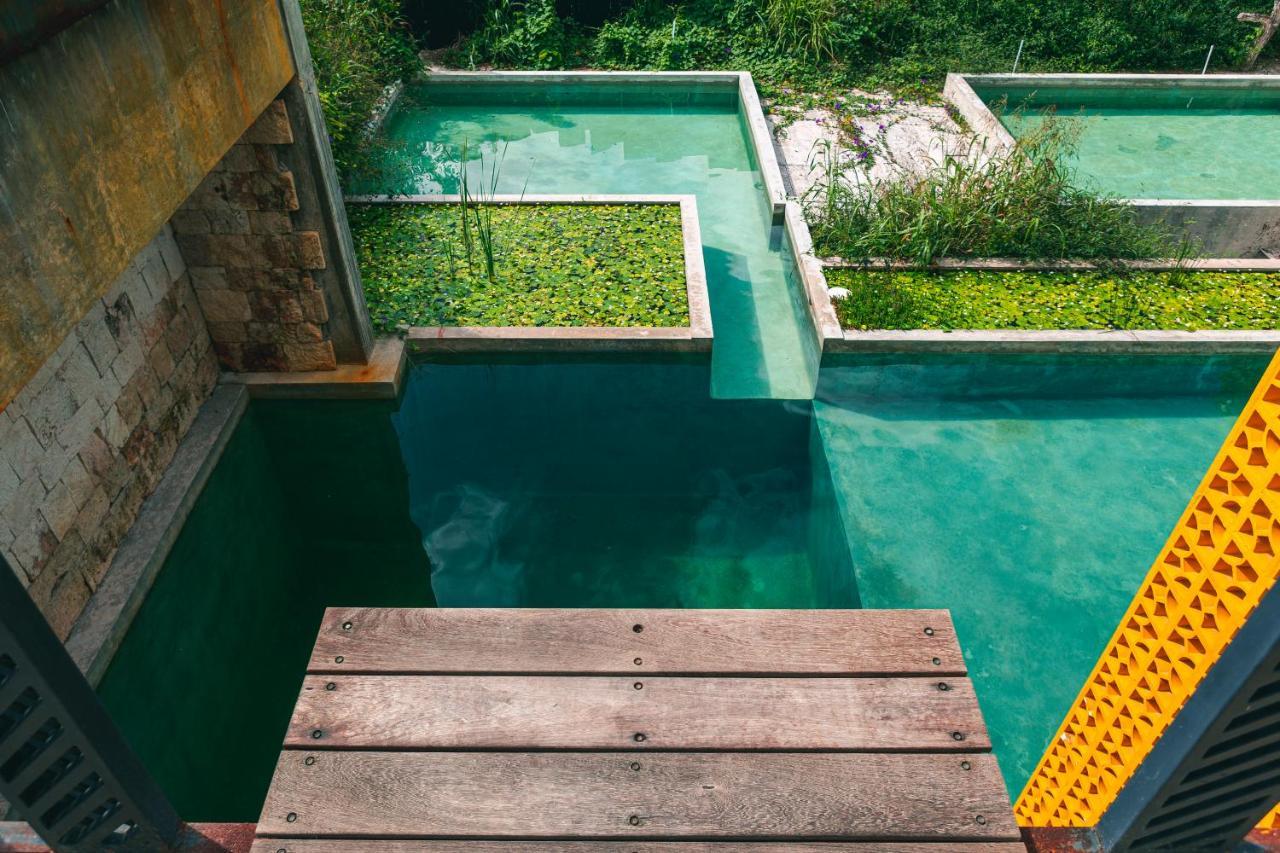 Hotel Makaaba Eco-Boutique Bacalar Eksteriør billede The swimming pool at the hotel